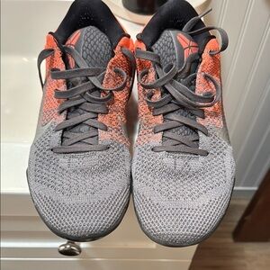 Nike Red and Gray Athletic Shoes with Breathable Knit Fabric